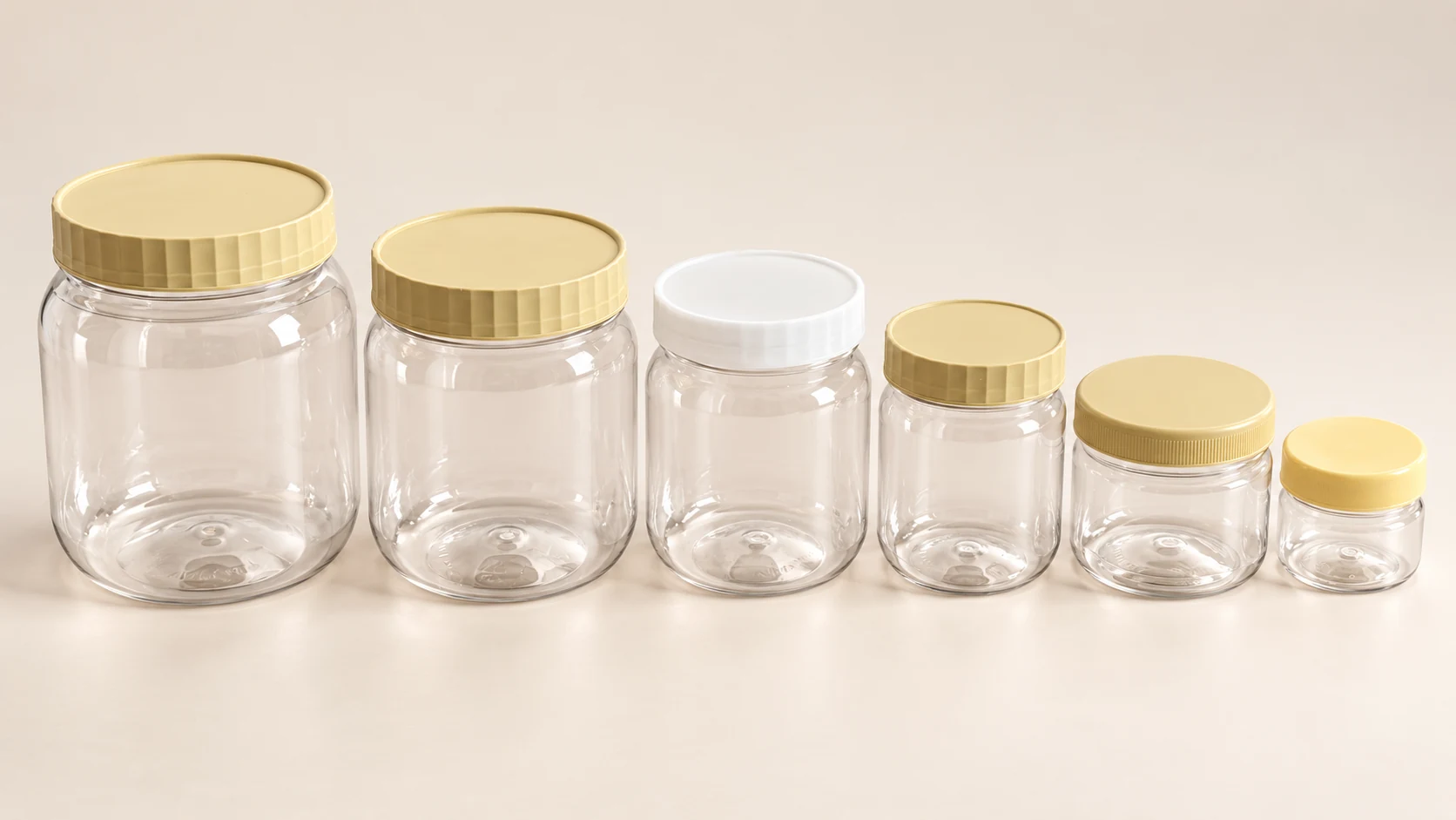 Hornplast clear plastic jars in several sizes with light-coloured lids